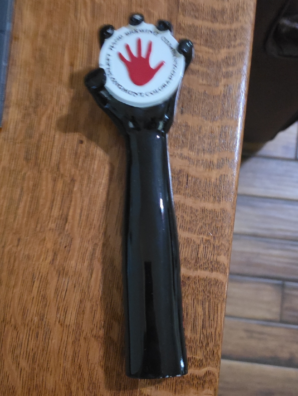 Black Hand-Handle Bottle Opener with Red Hand Logo